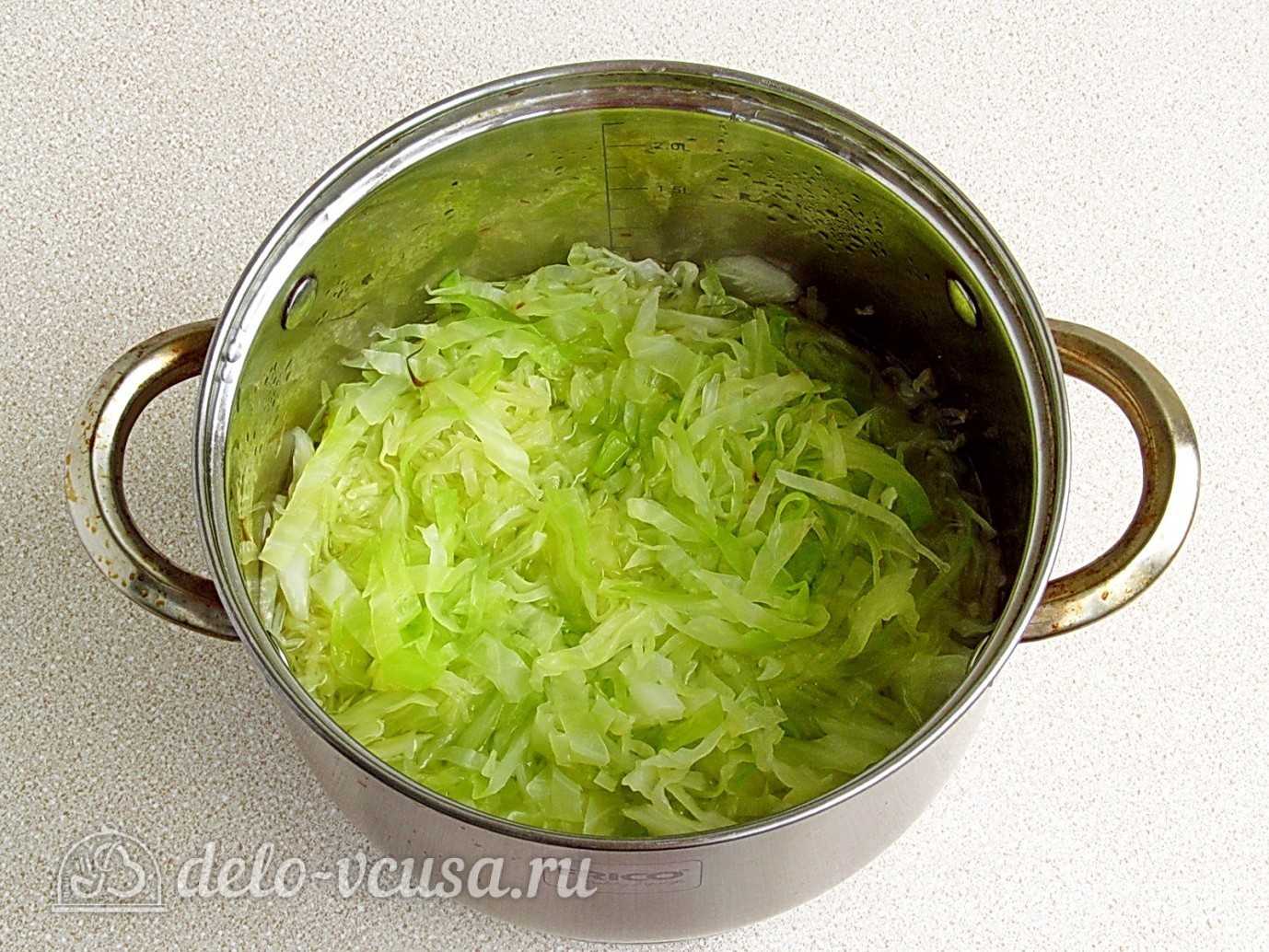 Шаг 11 приготовления Тушеная капуста с овощами и мясом
