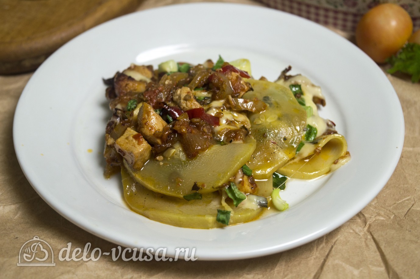 Обложка рецепта Запеченные кабачки с курицей и овощами